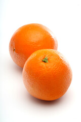 Oranges on white background - close-up