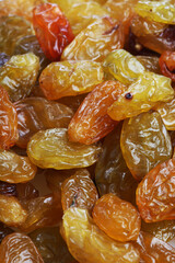 Raisins on white background - close-up