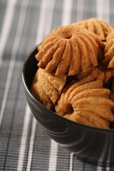 Cookies in black bowl - close-up