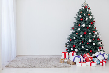 New Year's card interior of the white room red decor and Christmas tree with gifts