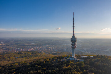 Obraz premium Hungary - TV tower in Pecs with Mecsek hills from drone view