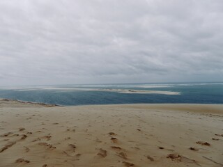 sand dunes on the beach Plage de la Corniche in the front of sandy spit Banc d'Arguin, Dune of Pilat, France
