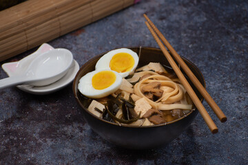 Vegetarian Miso Ramen with tofu, egg, mushrooms , copy space