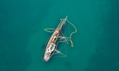 drone view of a wreck sailing boat