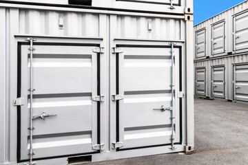 Stack of container shipping at dockyard in the port industrial area