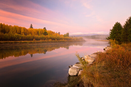 Reflections of fall color along the Deschutes river in Bend, Oregon