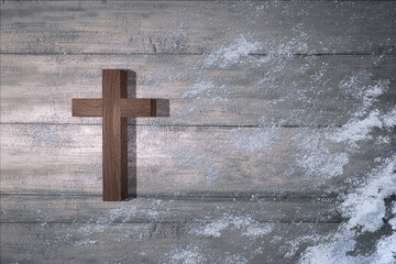 Christian cross with snow