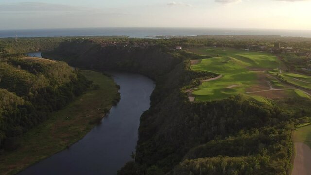 Flying over seaside Chavon river and Dye Fore golf course. Aerial