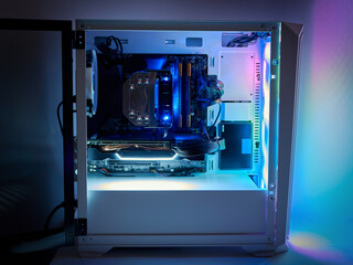 Gaming PC and CPU cooling fan with backlight. Desktop gaming computer with RGB led light inside....