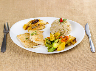 Typical Brazilian food, executive dish, food menu. Fish, rice and vegetables