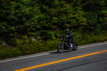 Motorcycle speeding through turn