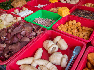 Tofu, clam, tree mushroom, cooked peanuts, stewed eggs, bamboo shoots and kelp sold in Taiwan traditional market.