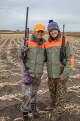 Pair of Sister Hunters looking for Pheasants in South Dakota