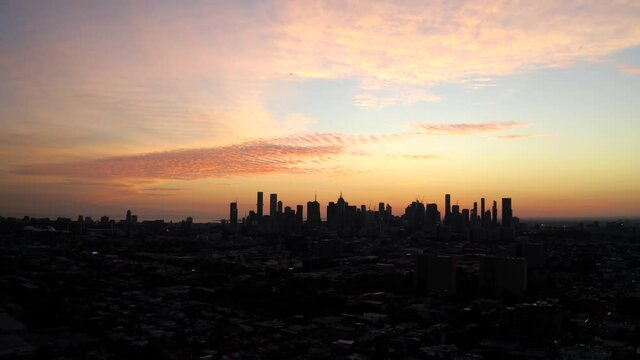 Epic clouds over Melbourne at sunset drone aerial shot