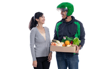 grocery store delivery. driver courier with food sending online order to female customer isolated over white