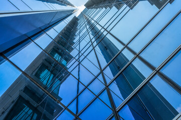Obraz premium glass architecture of modern building in tokyo.