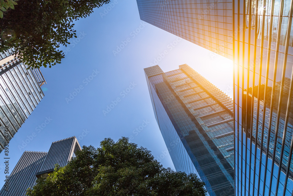 Canvas Prints modern office building against blue sky.