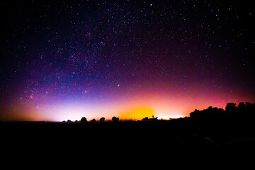 Night scenery with colorful and light yellow Milky Way Full of stars in the sky.