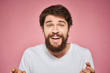 cheerful bearded man white t-shirt emotions cropped view pink background