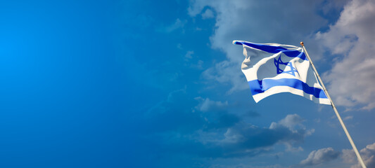 Israel national flag with blank text space on wide background.
