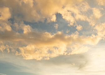 Fototapeta na wymiar Stratocumulus cold in golden hours. sunlight through clouds.