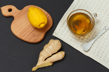 Health remedy foods for cold and flu relief on a black background.