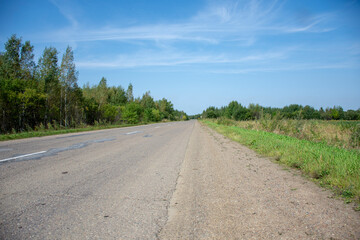 Russia. Autumn. Paved country road