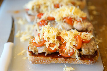 Making Chicken Tomato Sandwiches with Barberu Sauce.