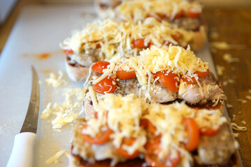 Making Chicken Tomato Sandwiches with Barberu Sauce.