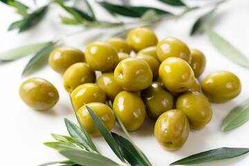 Salted olives placed on a white background