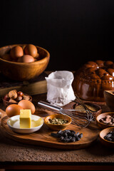 Fototapeta na wymiar Different baking ingredients, spices and kitchen utensils in vintage style