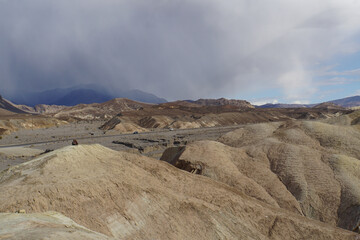 Storm clouds over Zabriskie Point at Death Valley National Park