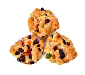 Freshly baked delicious sweet bun with raisins isolated white background. top view
