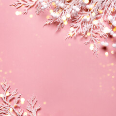 Christmas or New Year shine background in pastel colors. White frost branches with berries and bokeh lights