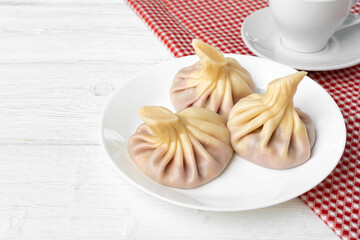 Traditional Georgian dish Khinkali stuffed dough close up