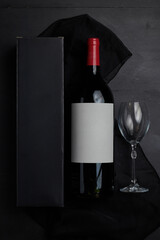 Single Bottle of Wine on a black Wood Table from top view