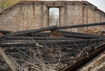 Fototapeta na wymiar Ruins of the abandoned burned house