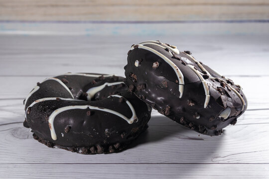 donuts of chocolate in white table