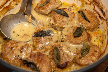 A delicious Chicken Cobbler with dumplings being cooked in a cooking dish