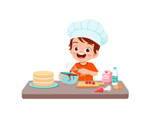 happy cute little kid boy and girl wear chef uniform and cooking a birthday cake