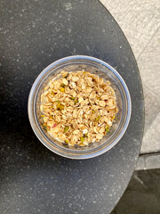 Take Away Granola in Plastic Glass Cup Container with Yogurt.