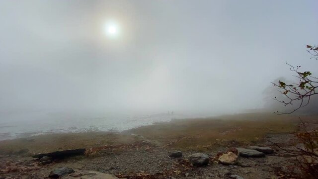 Stunning Misty, Coastal Maine With Clammer Working In Distance With Rolling Fog