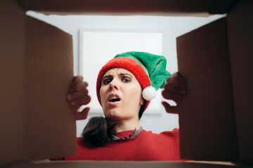 Disappointed Christmas Woman Looking Inside Cardboard Gift Box