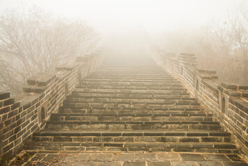 Stairs going up to the fog in a sepia dream