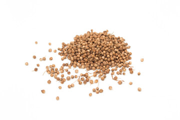 Coriander seeds on a white background.