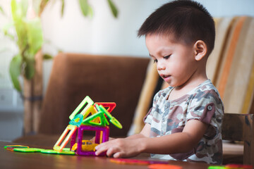 baby playing the magnetic tiles