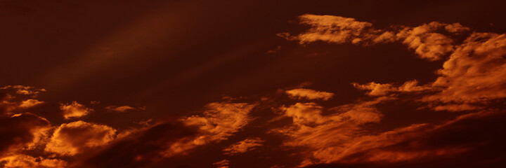 Fototapeta premium Sunset sky and sunrise orange bright abstract. Beautiful summer evening yellow clear cloud color day for wallpaper backdrop background. 