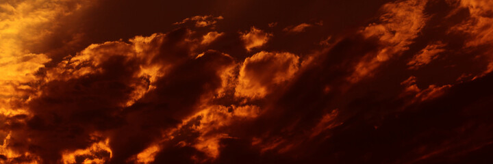 Sunset sky and sunrise orange bright abstract. Beautiful summer evening yellow clear cloud color day for wallpaper backdrop background.
