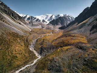Obraz premium Aerial view of mountain landscape with river in central Asia
