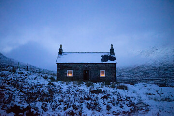 House covered with snow on a misty day - Powered by Adobe